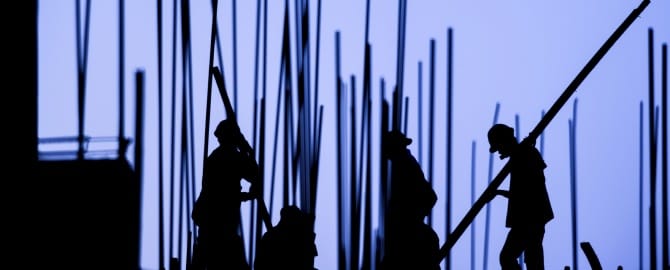 Men with poles 000042437976 670x270