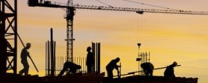 Men working on site at sunset 000002774936 670x270