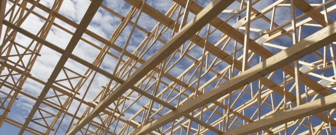 Wide angle view of a new constructed warehouse with its wooden frame work.