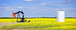 Oil pumpjack or nodding horse pumping unit in Saskatchewan prairies, Canada