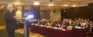 Sir Vivian Ramsey speaking to the EWI Singapore Conference 670x270