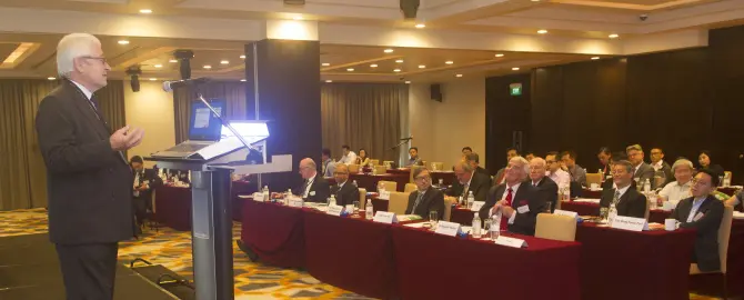 Sir Vivian Ramsey speaking to the EWI Singapore Conference 670x270